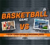 Mayor and City Manager tipoff in youth basketball game