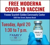 Person holding a vial of COVID-19 vaccine