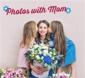 Two girls with their mother who is holding flowers